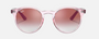 Ray-Ban Junior RJ9064S 7052V0 phantos sunglasses for kids in full rim injected, with polished transparent pink frame, and clear gradient red mirror red lenses. 44mm in lens size, 19mm in bridge size, and 130mm in temple length.