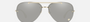 Versace VE2231 12526G pilot sunglasses for women in rimless metal, with pale gold frame, and light grey mirror silver lenses. 60mm in lens size, 14mm in bridge size, and 140mm in temple length.