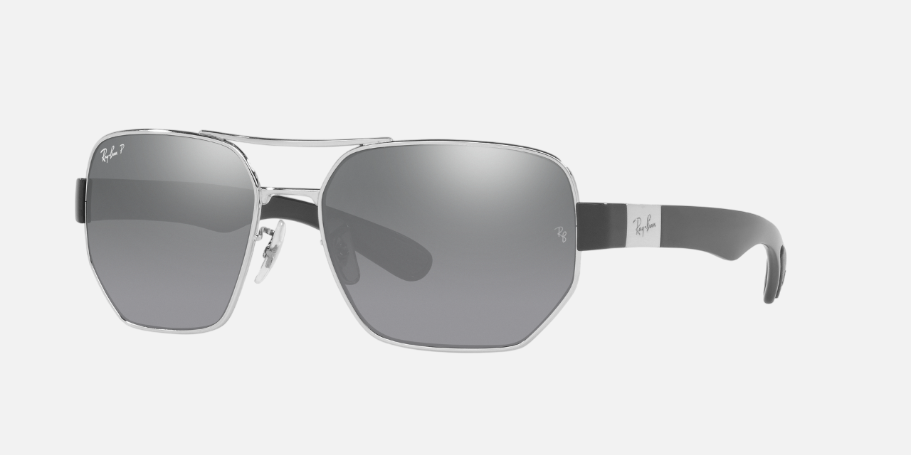 Ray-Ban RB3672 003/82 rectangular sunglasses for unisex in full rim metal, with silver frame, and grey mirror silver lenses. 60mm in lens size, 17mm in bridge size, and 135mm in temple length.
