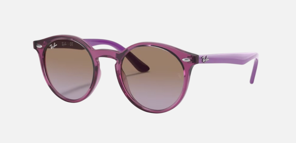 Ray-Ban Junior RJ9064S 706468 phantos sunglasses for kids in full rim injected, with polished transparent fuxia frame, and violet gradient brown lenses. 44mm in lens size, 19mm in bridge size, and 130mm in temple length.