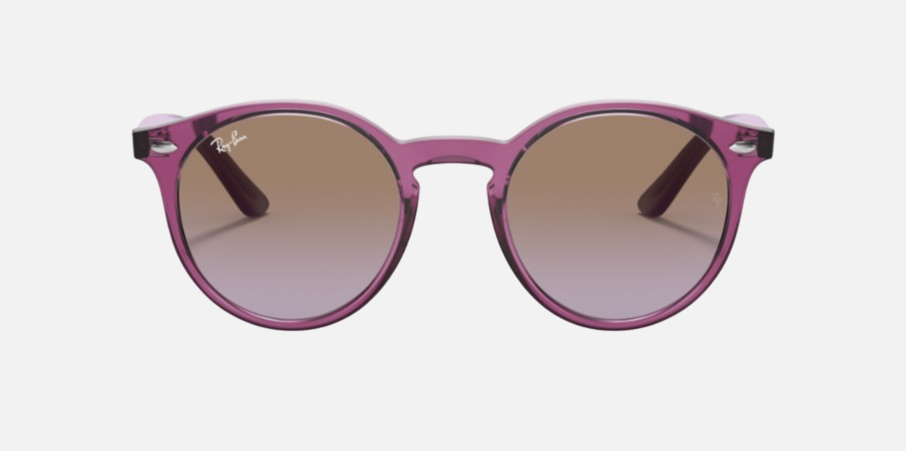 Ray-Ban Junior RJ9064S 706468 phantos sunglasses for kids in full rim injected, with polished transparent fuxia frame, and violet gradient brown lenses. 44mm in lens size, 19mm in bridge size, and 130mm in temple length.