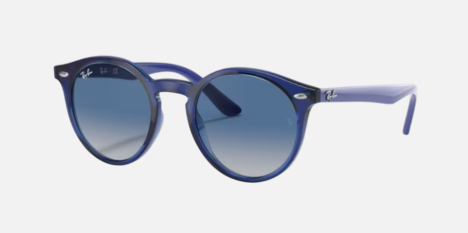 Ray-Ban Junior RJ9064S 70624L phantos sunglasses for kids in full rim injected, with polished transparent blue frame, and light grey gradient dark blue
  lenses. 44mm in lens size, 19mm in bridge size, and 130mm in temple length.
