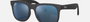 Ray-Ban Junior Justin Kids RJ9069S 702855 square sunglasses for kids in full rim injected, with matte rubber black frame, and blue mirror lenses. 48mm in lens size, 16mm in bridge size, and 130mm in temple length.