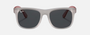 Ray-Ban Junior Justin Kids RJ9069S 705987 square sunglasses for kids in full rim injected, with matte transparent grey frame, and dark grey lenses. 48mm in lens size, 16mm in bridge size, and 130mm in temple length.