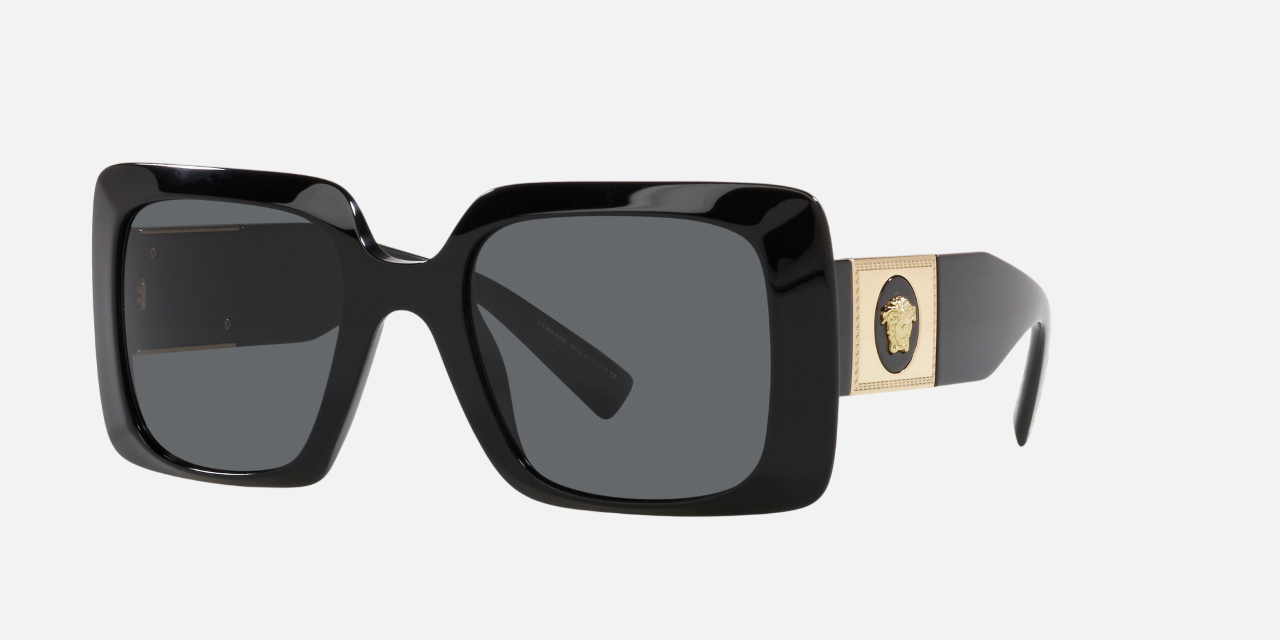 Versace VE4405 GB187 rectangular sunglasses for women in full rim plastic, with black frame, and dark grey lenses. 54mm in lens size, 22mm in bridge size, and 140mm in temple length.