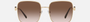 Bvlgari BV6165 278/13 square sunglasses for women in full rim metal, with pale gold frame, and gradient brown lenses. 57mm in lens size, 18mm in bridge size, and 140mm in temple length.