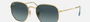 Ray-Ban Hexagonal Flat Lenses RB3548N 91233M hexagonal sunglasses for unisex in full rim metal, with gold frame, and blue lenses. 54mm in lens size, 21mm in bridge size, and 145mm in temple length.