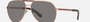 Bvlgari BV5055K 200681 aviator sunglasses for men in full rim metal, with matte pink gold plated frame, and dark grey lenses. 62mm in lens size, 14mm in bridge size, and 145mm in temple length.
