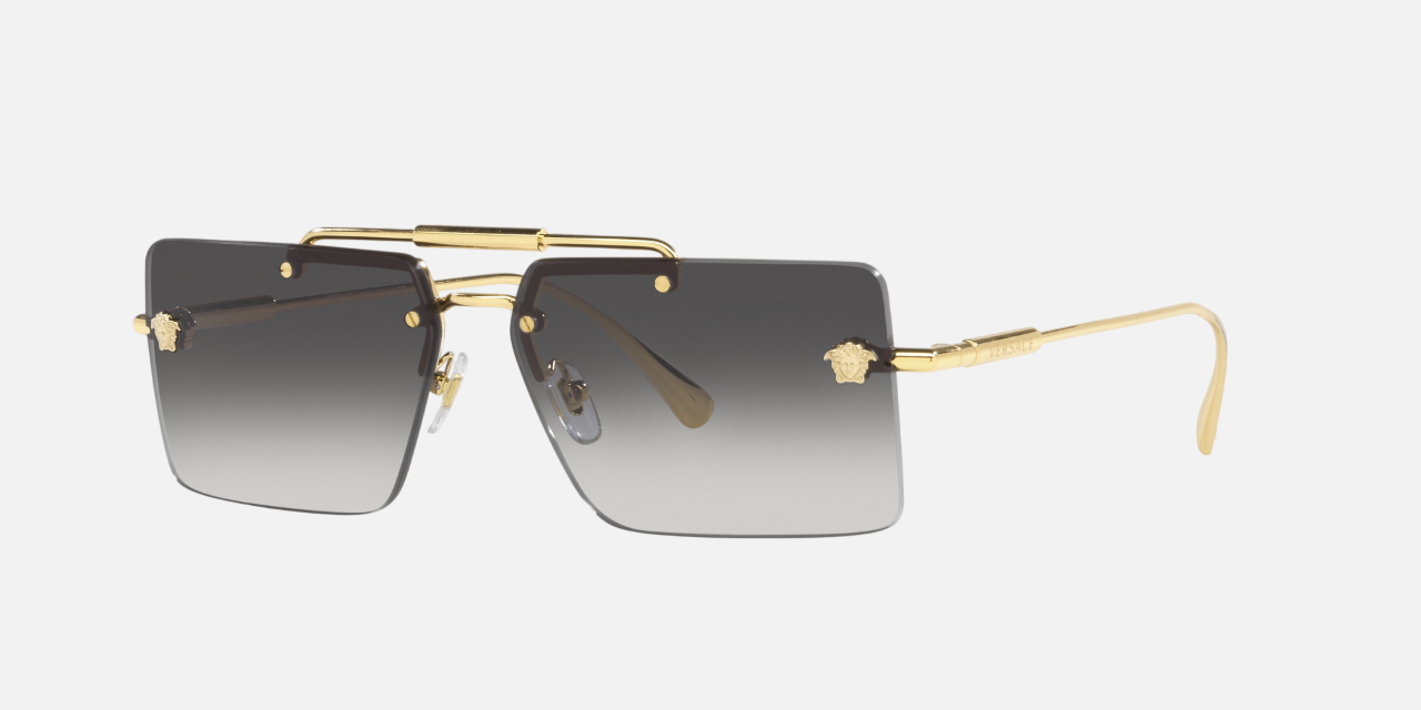 Versace VE2245 10028G women's rimless rectangle sunglasses in a gold metal frame with grey gradient lenses. Features a 60 mm lens size, 13 mm bridge size, and 145 mm temple length. Available in Dubai, UAE.