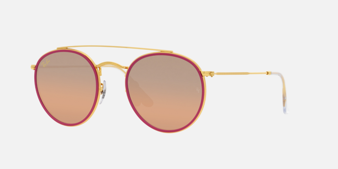 Ray-Ban Round Double Bridge RB3647N 92373E unisex's full rim round sunglasses in a polished gold metal frame with pink mirror gradient grey lenses. Features a 51 mm lens size, 22 mm bridge size, and 145 mm temple length. Available in Dubai, UAE.