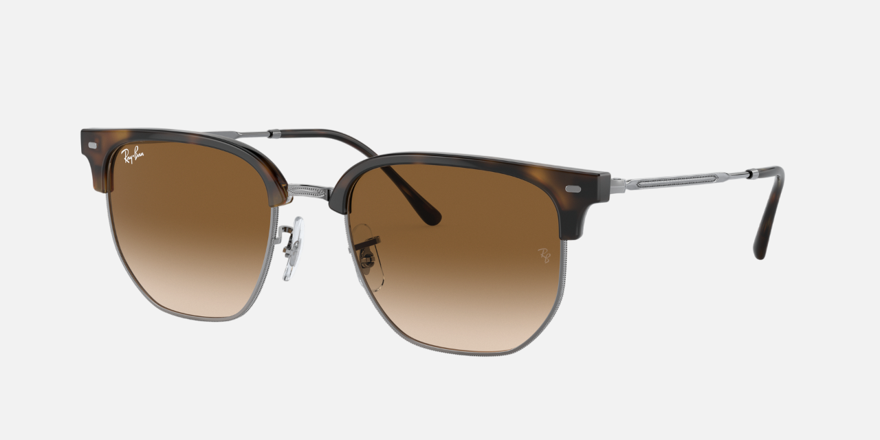 Ray-Ban New Clubmaster RB4416 710/51 unisex's full rim irregular sunglasses in a havana metal frame with brown lenses. Features a 53 mm lens size, 20 mm bridge size, and 145 mm temple length. Available in Dubai, UAE.