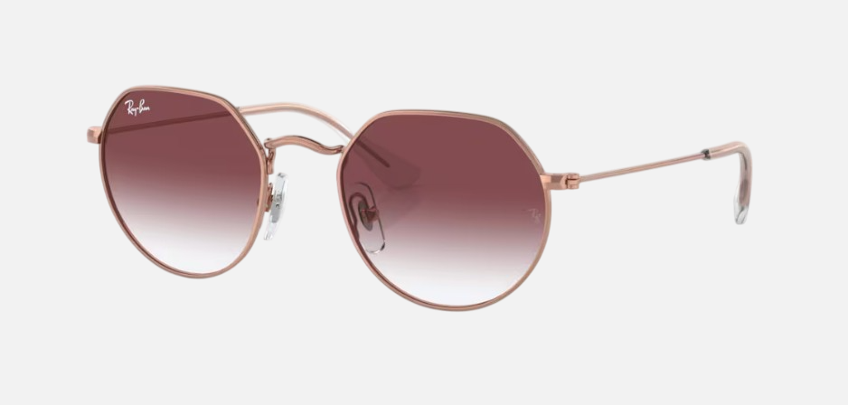 Ray-Ban Junior Jack Kids RJ9565S 291/8H irregular sunglasses for kids in full rim metal, with polished rose gold frame, and gradient dark violet lenses. 47mm in lens size, 19mm in bridge size, and 130mm in temple length.