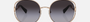 Bvlgari BV6181B 20148G round sunglasses for women in semi-rimless metal, with pink gold frame, and grey gradient lenses. 57mm in lens size, 20mm in bridge size, and 140mm in temple length.