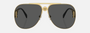 Versace VE2255 100287 pilot sunglasses for unisex in full rim metal, with gold frame, and dark grey lenses. 63mm in lens size, 13mm in bridge size, and 145mm in temple length.