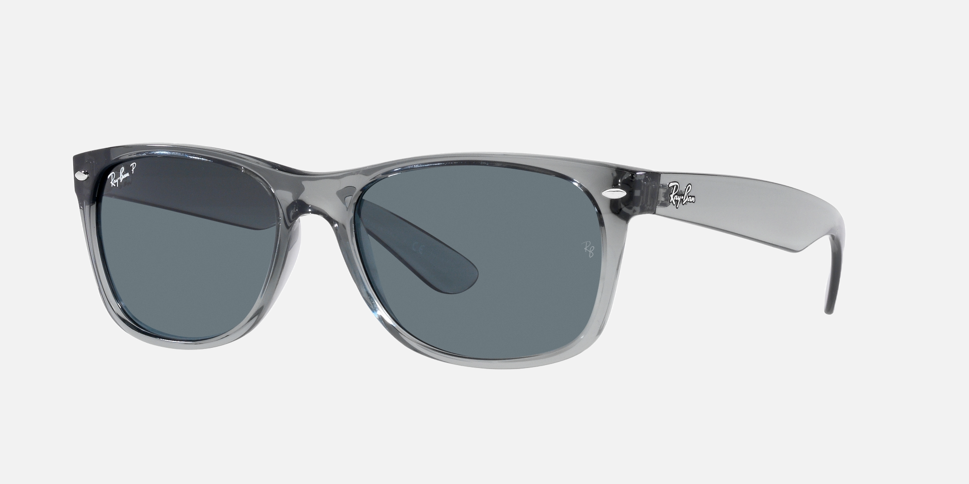 Ray-Ban New Wayfarer RB2132 64503R square sunglasses for unisex in full rim plastic, with transparent grey frame, and dark blue lenses. 55mm in lens size, 18mm in bridge size, and 145mm in temple length.