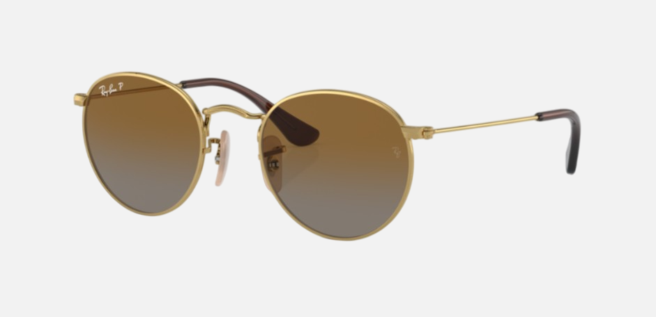 Ray-Ban Junior Round Kids RJ9547S 223/T5 round sunglasses for kids in full rim metal, with polished arista gold frame, and brown polarized lenses. 44mm in lens size, 19mm in bridge size, and 130mm in temple length.