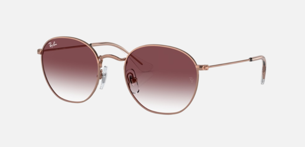 Ray-Ban Junior Rob Kids RJ9572S 291/8H irregular sunglasses for kids in full rim metal, with polished rose gold frame, and violet lenses. 48mm in lens size, 19mm in bridge size, and 130mm in temple length.
