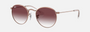 Ray-Ban Junior Round Kids RJ9547S 291/8H round sunglasses for kids in full rim metal, with polished rose gold frame, and violet lenses. 44mm in lens size, 19mm in bridge size, and 130mm in temple length.