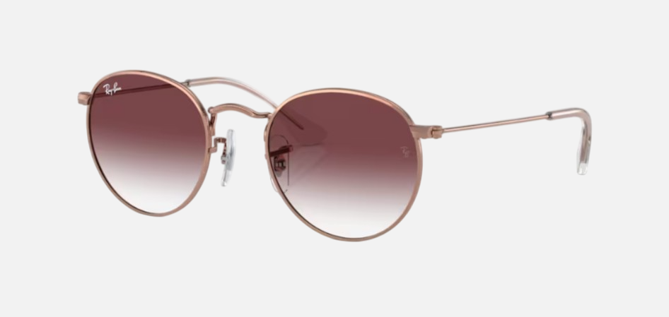 Ray-Ban Junior Round Kids RJ9547S 291/8H round sunglasses for kids in full rim metal, with polished rose gold frame, and violet lenses. 44mm in lens size, 19mm in bridge size, and 130mm in temple length.