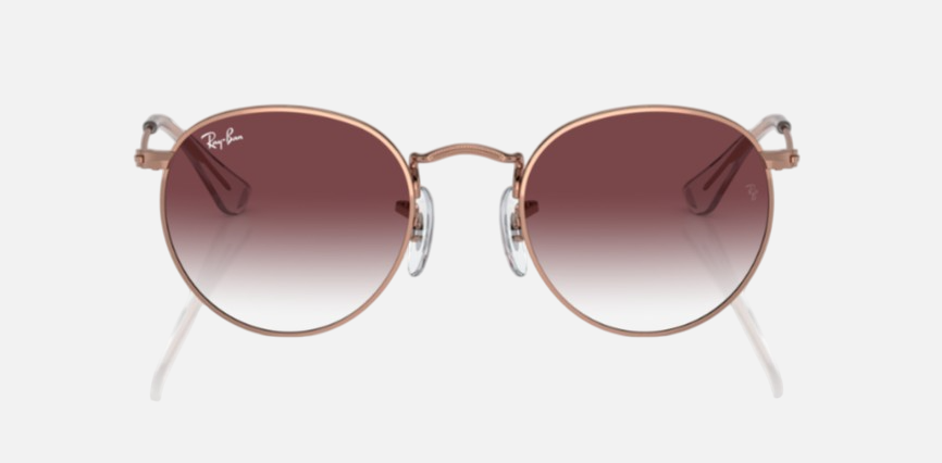 Ray-Ban Junior Round Kids RJ9547S 291/8H round sunglasses for kids in full rim metal, with polished rose gold frame, and violet lenses. 44mm in lens size, 19mm in bridge size, and 130mm in temple length.
