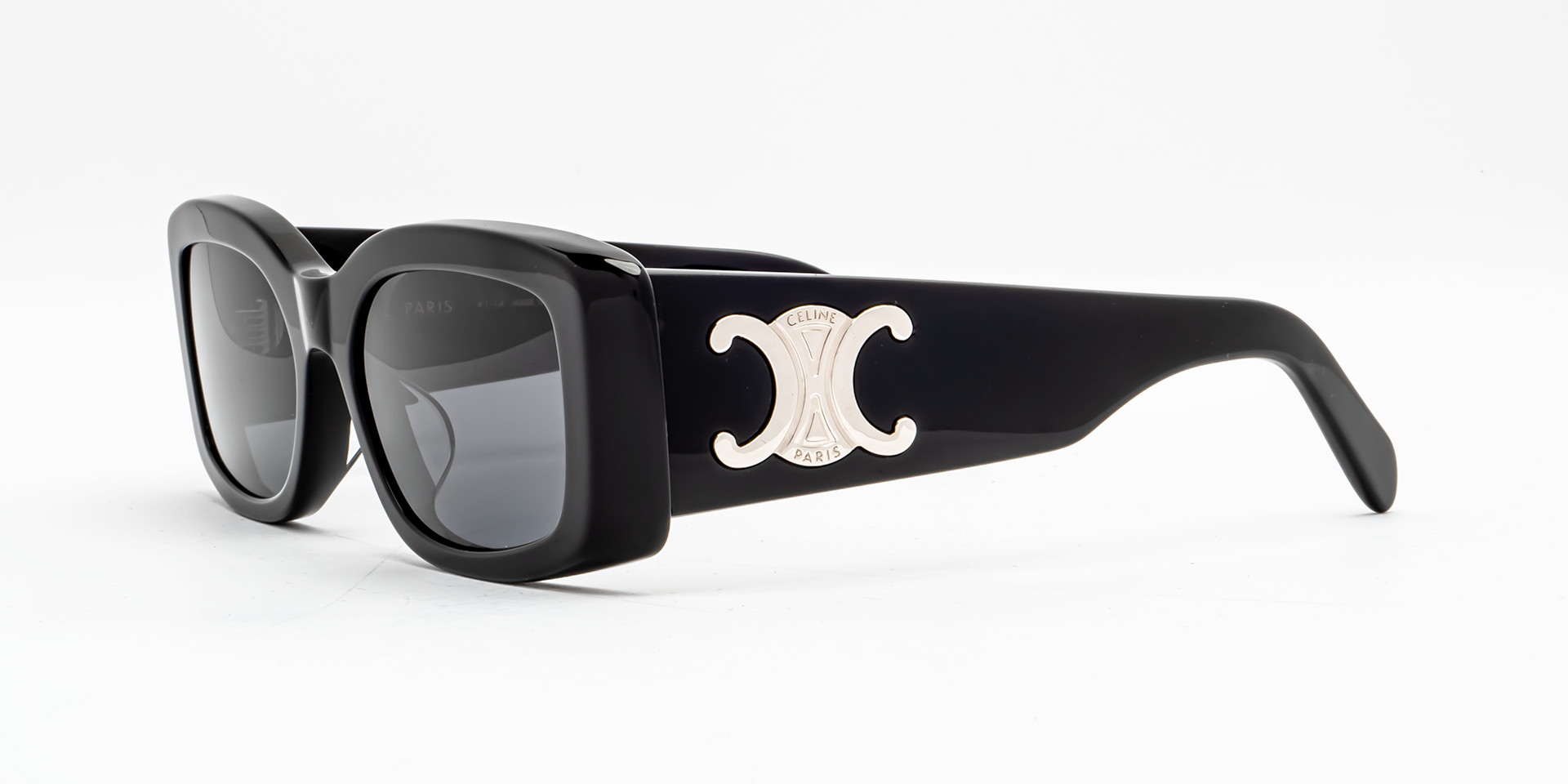 Celine Triomphe CL40282U 01A square sunglasses for women in full rim acetate, with shiny black with silver frame, and grey lenses. 53mm in lens size, 18mm in bridge size, and 135mm in temple length.