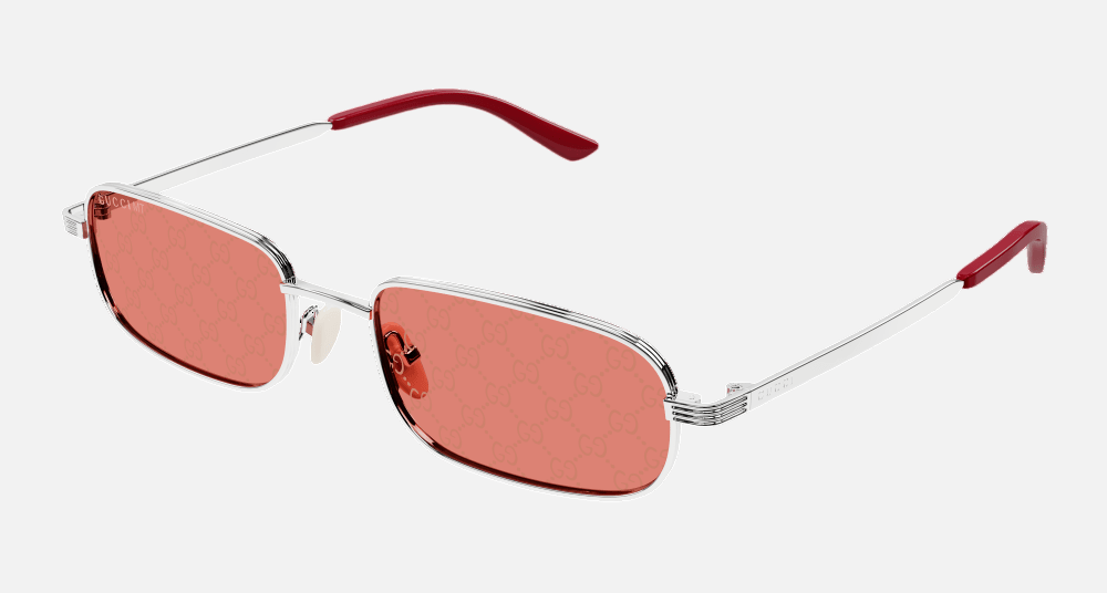 Gucci GG1457S 004 rectangular sunglasses for men in full rim metal, with silver frame, and red lenses. 57mm in lens size, 19mm in bridge size, and 145mm in temple length.