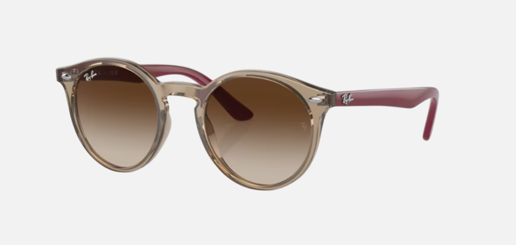 Ray-Ban Junior RJ9064S 712313 phantos sunglasses for kids in full rim injected, with polished transparent brown frame, and brown lenses. 44mm in lens size, 19mm in bridge size, and 130mm in temple length.
