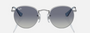 Ray-Ban Junior Round Kids RJ9547S 212/4L round sunglasses for kids in full rim metal, with polished silver frame, and grey/blue lenses. 44mm in lens size, 19mm in bridge size, and 130mm in temple length.