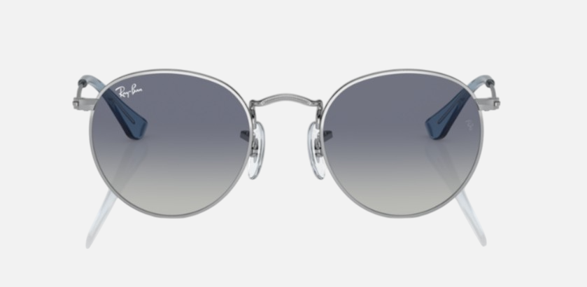 Ray-Ban Junior Round Kids RJ9547S 212/4L round sunglasses for kids in full rim metal, with polished silver frame, and grey/blue lenses. 44mm in lens size, 19mm in bridge size, and 130mm in temple length.