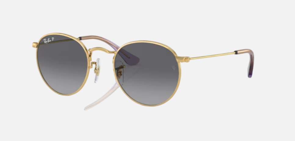 Ray-Ban Junior Round Kids RJ9547S 292/T3 round sunglasses for kids in full rim metal, with polished arista gold frame, and grey polarized lenses. 44mm in lens size, 19mm in bridge size, and 130mm in temple length.