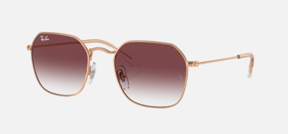 Ray-Ban Junior RJ9594S 291/8H irregular sunglasses for kids in full rim metal, with polished rose gold frame, and clear & dark violet lenses. 49mm in lens size, 19mm in bridge size, and 130mm in temple length.