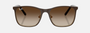 Ray-Ban Junior RJ9551S 297/13 square sunglasses for kids in full rim metal, with brown frame, and brown gradient lenses. 48mm in lens size, 16mm in bridge size, and 125mm in temple length.