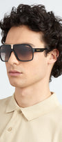 Carrera 1014/S 807 pilot sunglasses for men in full rim plastic, with black frame, and gradient brown lenses. 64mm in lens size, 10mm in bridge size, and 135mm in temple length.
