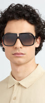 Carrera 1014/S 807 pilot sunglasses for men in full rim plastic, with black frame, and gradient brown lenses. 64mm in lens size, 10mm in bridge size, and 135mm in temple length.