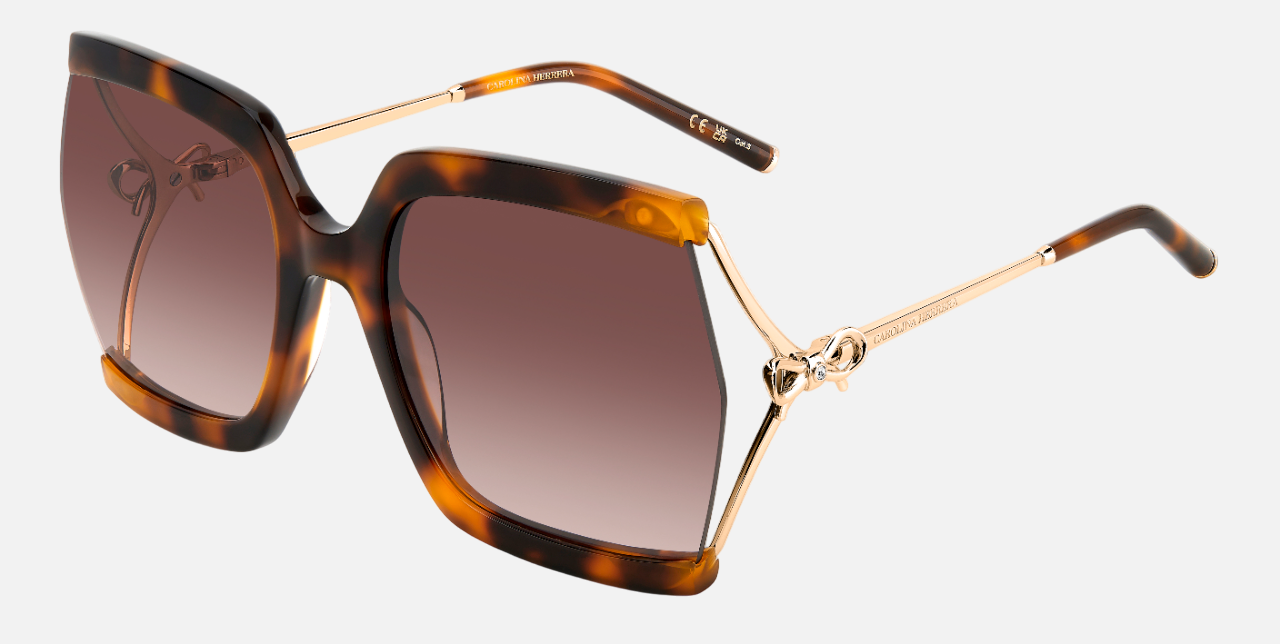 Carolina Herrera HER 0216/G/S LVL oversized sunglasses for women in semi-rimless plastic, with havana gold frame, and gradient brown lenses. 61mm in lens size, 22mm in bridge size, and 120mm in temple length.