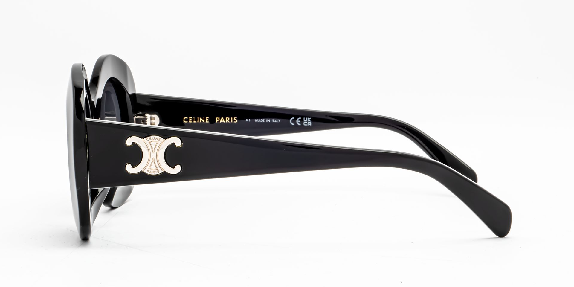 Celine Triomphe CL40292U 01A round sunglasses for women in full rim acetate, with black frame, and grey lenses. 54mm in lens size, 20mm in bridge size, and 140mm in temple length.