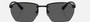 Armani Exchange AX2048S 600087 irregular sunglasses for men in full rim metal, with matte black frame, and dark grey lenses. 59mm in lens size, 16mm in bridge size, and 145mm in temple length.