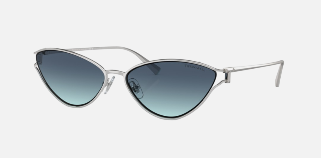 Tiffany TF3095 60019S cat eye sunglasses for women in full rim metal, with silver frame, and blue gradient lenses. 61mm in lens size, 16mm in bridge size, and 135mm in temple length.
