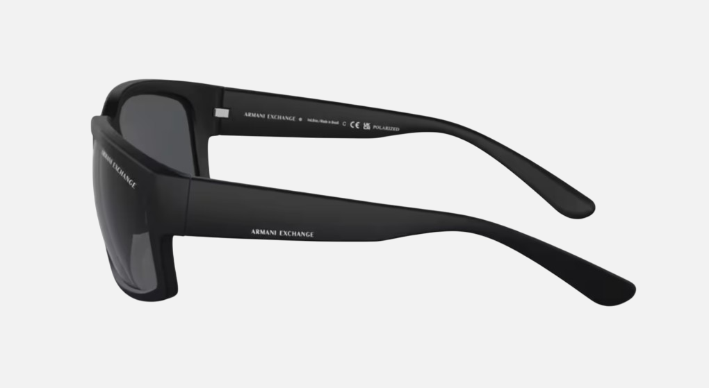 Armani Exchange AX4142SU 807887 square sunglasses for men in full rim plastic, with matte black frame, and dark grey polarized lenses. 61mm in lens size, 17mm in bridge size, and 135mm in temple length.
