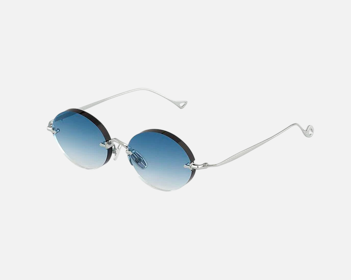 Eyepetizer Wilmot C.4-56 women's rimless oval sunglasses in a gold steel frame with aqua green lenses. Features a 54 mm lens size, 18 mm bridge size, and 145 mm temple length. Available in Dubai, UAE.