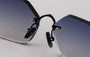 Eyepetizer Carnaby C.6-51 hexagonal sunglasses for unisex in rimless steel, with black frame, and grey gradient lenses. 50mm in lens size, 18mm in bridge size, and 145mm in temple length.