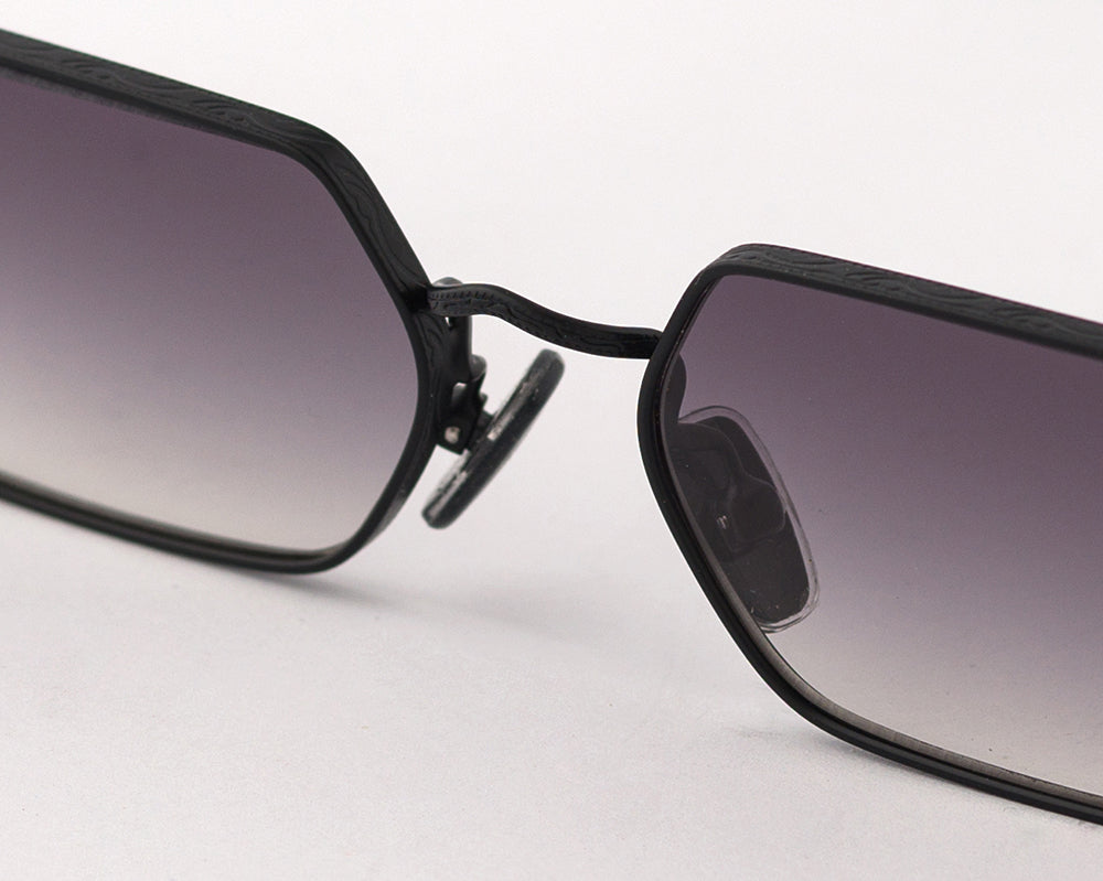 Eyepetizer Cavallet C.6-27 hexagonal sunglasses for unisex in full rim steel, with black frame, and grey gradient lenses. 55mm in lens size, 17mm in bridge size, and 145mm in temple length.