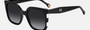 Carolina Herrera HER 0128/S 80S/9O  women's full rim cat eye sunglasses in black white frame and dark grey gradient lenses, with 54mm lens size, 21mm bridge size, and 145mm temple size. Available in Dubai, UAE.