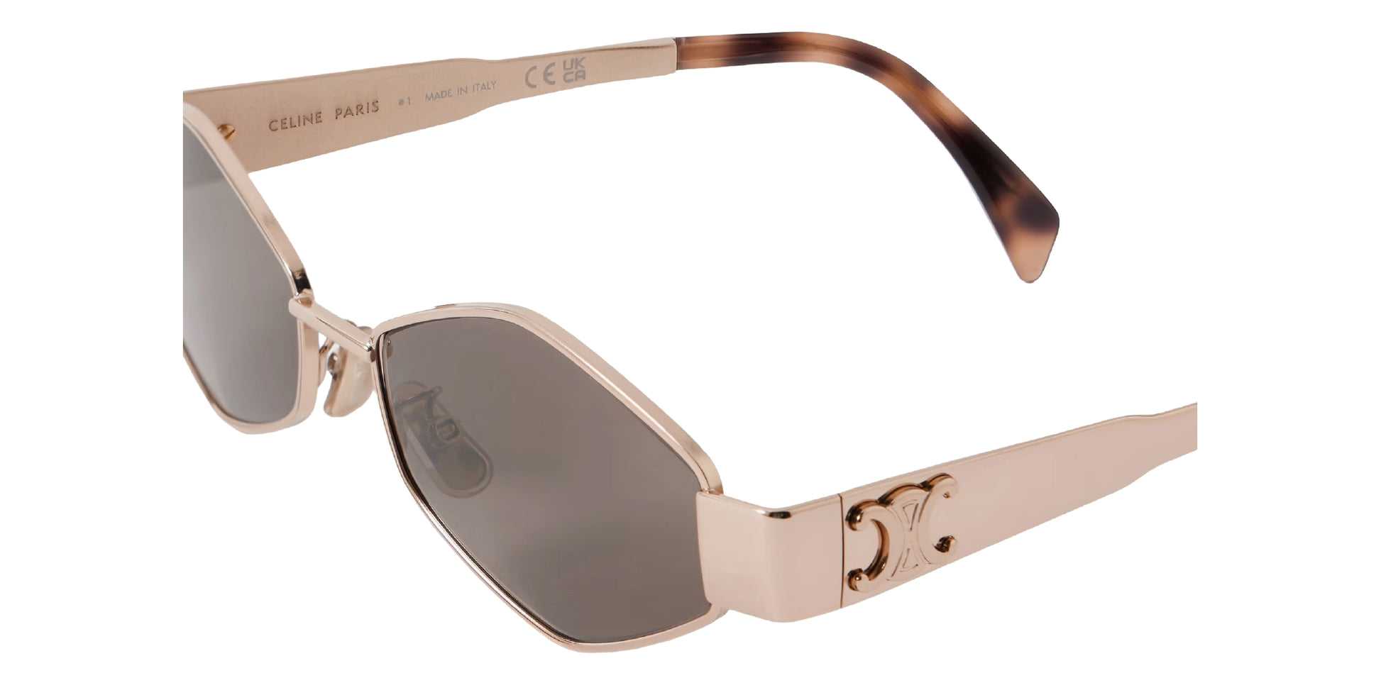 Celine Triomphe Metal 02 CL40254U 28A women's full rim hexagonal sunglasses in a rose gold metal frame with brown lenses. Features a 54 mm lens size, 16 mm bridge size, and 135 mm temple length. Available in Dubai, UAE.