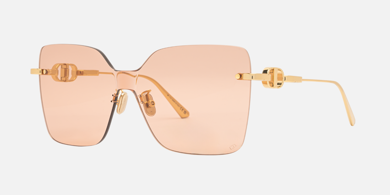 Christian Dior CD CHAIN M1U B0L0 shield sunglasses for women in rimless metal, with shiny gold frame, and light pink lenses. 140mm in lens size, 0mm in bridge size, and 120mm in temple length.