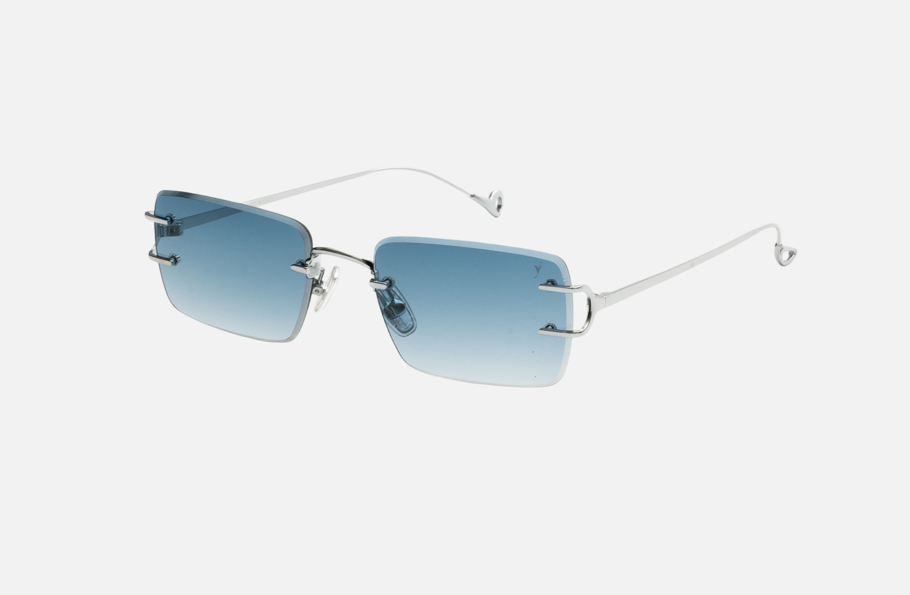 Eyepetizer Dillinger C.1-26 rectangular sunglasses for unisex in rimless steel, with silver frame, and blue gradient lenses. 52mm in lens size, 18mm in bridge size, and 145mm in temple length.