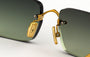 Eyepetizer Etherege C.4-52 square sunglasses for unisex in rimless steel, with gold frame, and green gradient lenses. 52mm in lens size, 18mm in bridge size, and 145mm in temple length.