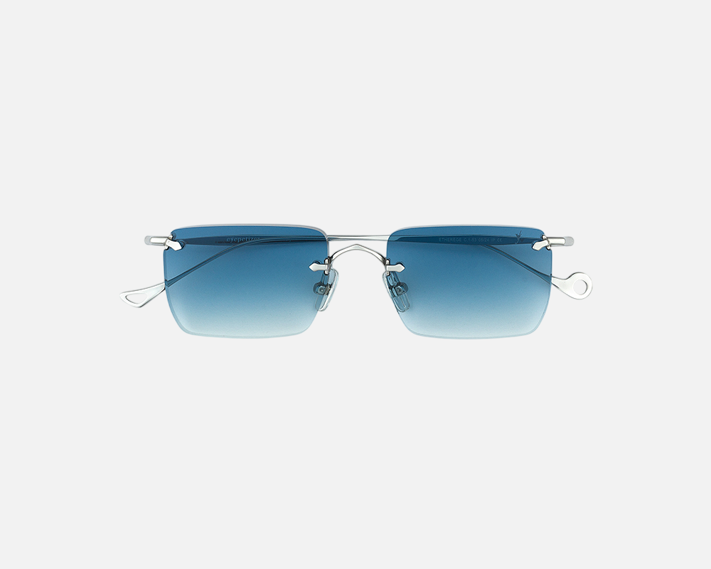 Eyepetizer Etherege C.1-53 rectangular sunglasses for unisex in rimless steel, with silver frame, and blue gradient lenses. 52mm in lens size, 18mm in bridge size, and 145mm in temple length.