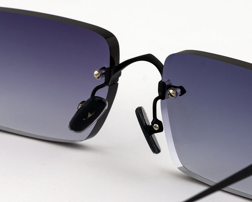 Eyepetizer Etherege C.6-51 square sunglasses for unisex in rimless steel, with black frame, and grey lenses. 52mm in lens size, 18mm in bridge size, and 145mm in temple length.