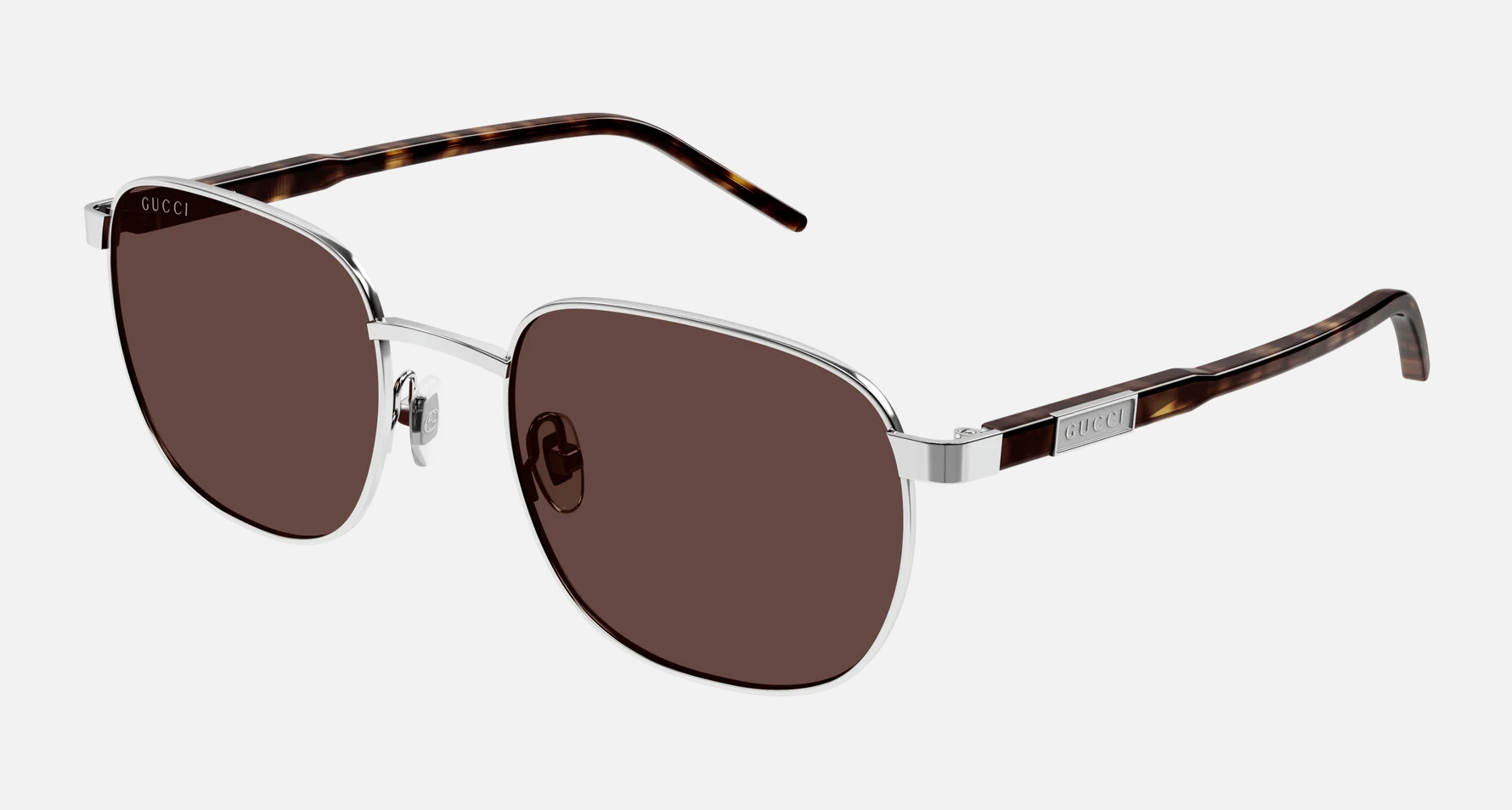 Gucci GG1799S 002 men's full rim square sunglasses in a silver metal frame with brown lenses. Features a 54 mm lens size, 20 mm bridge size, and 145 mm temple length. Available in Dubai, UAE.